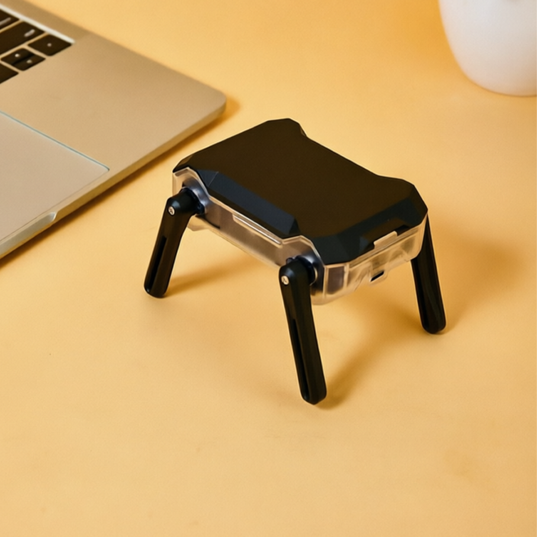 A Tiny Desktop Robot with 99 Games and the Power to Create Your Own