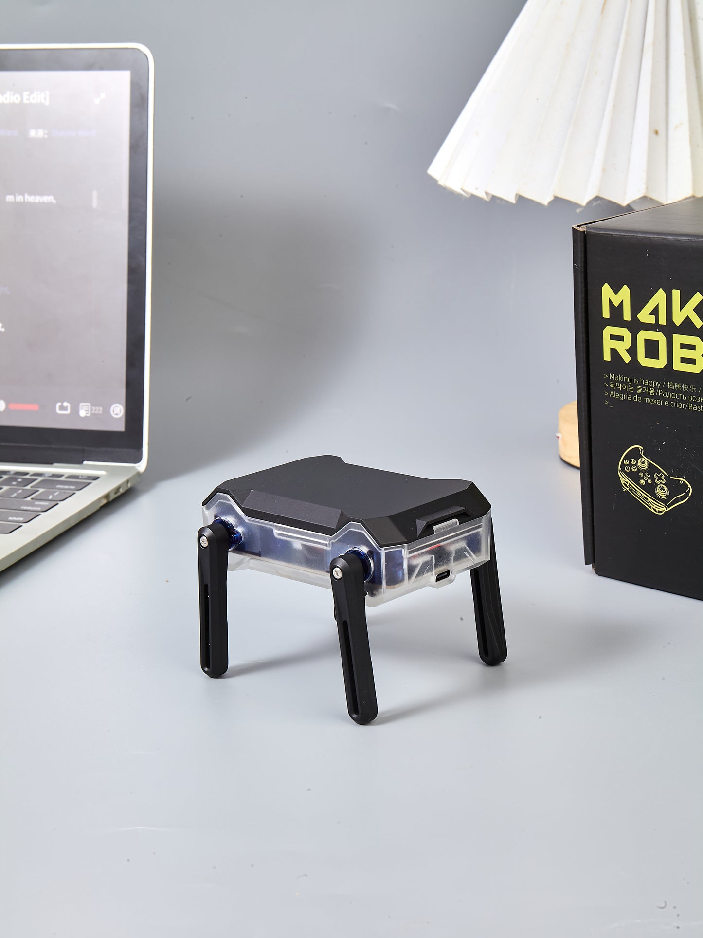 A Tiny Desktop Robot with 99 Games and the Power to Create Your Own